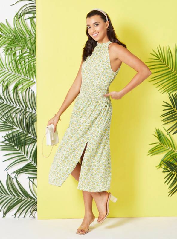 فستان ميدي بياقة هالتر ودرزات وطبعات